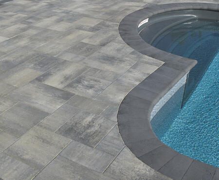 Patio with pool using Rialto and Cassina Coping products from Brampton Brick