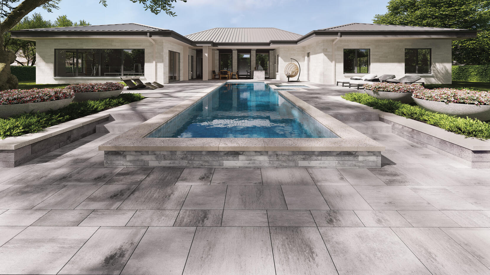 Modern house using Oaks Landscape products, pavers and walls