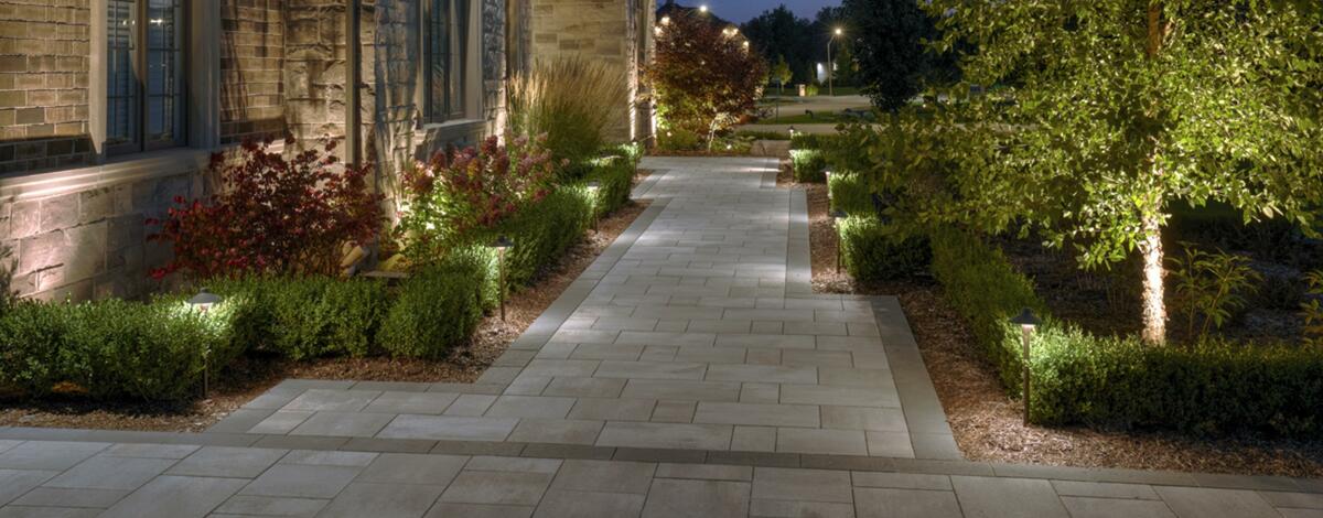 Driveway and walkway using Nueva Paver, Champagne with Onyx border by Oaks Landscape Products